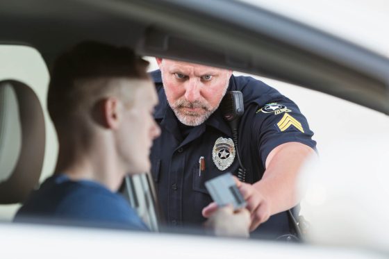 Police officer doing a DUI test - Cost-U-Less - cheap auto insurance in California